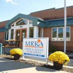 Exterior of MRTSA main headquarters building with sign out front